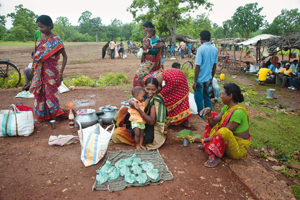 IN GOOD CHEER Haandiya (local wine) market in Kalinganagar, close to the Tata site. The general state of cheer among local folk here is in stark contrast to the mood among people affected by Poscos project