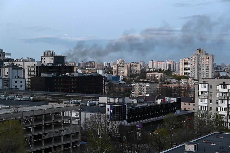 A photograph shows smoke above Kyiv after strikes on April 18, 2022, on the 64th day of the Russian invasion of Ukraine. Russian strikes slammed into Kyiv on April 28, 2022 evening as UN Secretary-General Antonio Guterres was visiting, in the first such bombardment of Ukraine's capital since mid-April, the mayor and AFP correspondents said.​ (Credits: SERGEY VOLSKIY / AFP)