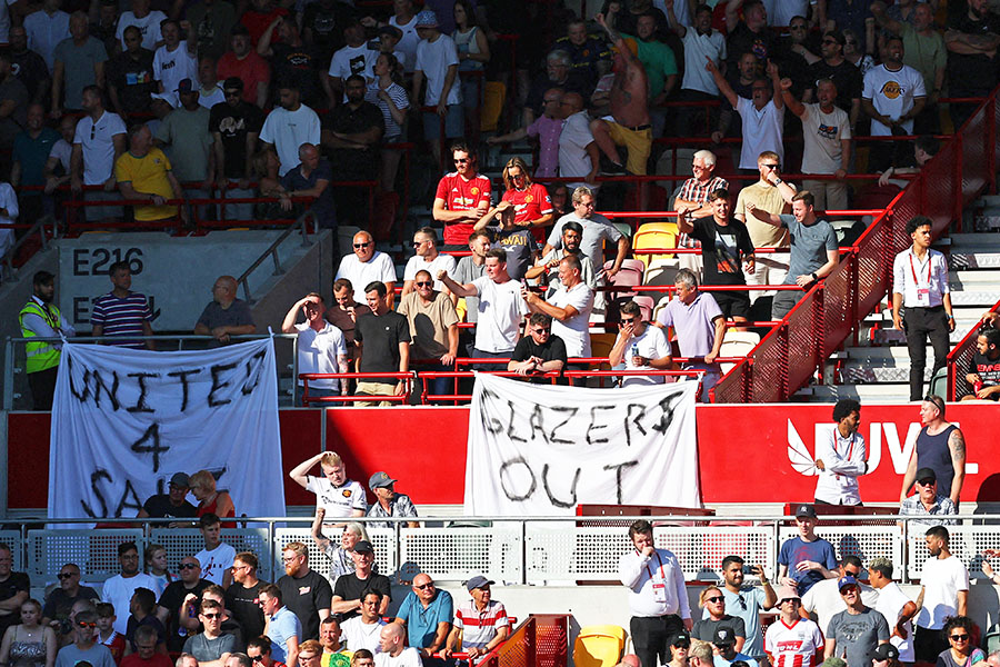 Manchester United fans display banners in protest of the Glazer family’s ownership of the club inside the stadium before the Manchester United vs Brentford Premier League match in Brentford Community Stadium, London, Britain, August 13, 2022 Image: REUTERS/David Klein

