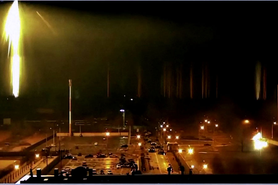 A file photo of a screen grab from a footage of the Zaporizhzhia nuclear authority shows a wide view of the Ukrainian nuclear plant during attack with shell fire by Russian forces in early March. Image: Zaporizhzhia NPP / ESN / AFP