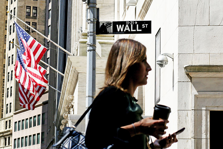 A woman walks near to The New York Stock Exchange, on July 12, 2022 in New York. Wall Street is back to falling amid recession, the S&P 500 closed 1.2% lower while tech stocks pushed the Nasdaq down 2.3%.
Image: John Smith/VIEWpress via Getty Images
