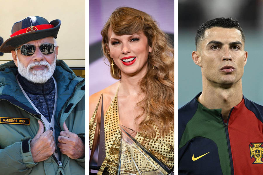 Narendra Modi, Taylor Swift, and Cristiano Ronaldo (l to r) are the most influential people on Twitter, according to Brandwatch.
Image: Valerie Macon ? Noah Seelam / AFP 