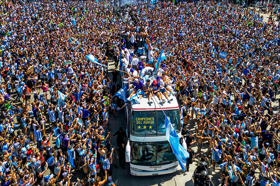 'Muchachos' was heard on repeat in central Buenos Aires where huge crowds of fans gathered to welcome the victorious team. Image Credit: Photography TOMAS CUESTA / AFP
