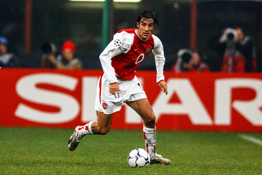 (File photo) Robert Pires of Arsenal is seen during the UEFA Champions League Group B match between Inter Milan and Arsenal at the San Siro Stadium on November 25, 2003 in Milan, Italy.  
Image: Etsuo Hara/Getty Images 