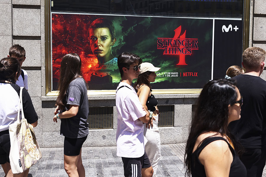 People wait in a line to enter 'The Lab', Stranger Things Netflix series experience venue in Madrid, Spain on June 27th, 2022. The visit in The Lab located at the Telefónica Building is free for everyone. This is one of two experiences the Netflix series has opened in Madrid to coincide with the premiere of its fourth season
Image: Beata Zawrzel/NurPhoto via Getty Images
