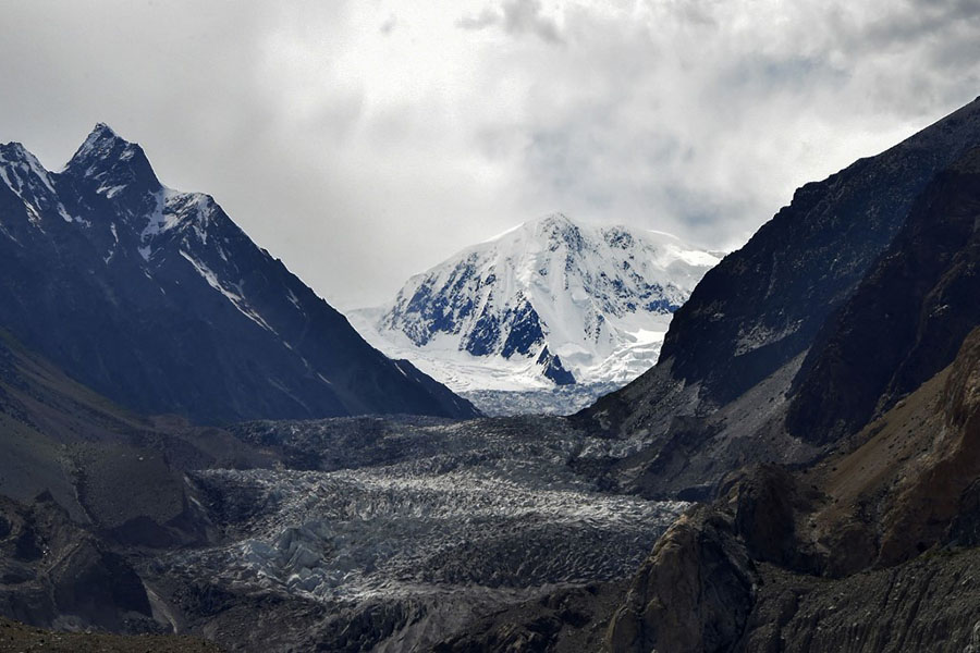 This aerial picture taken on June 10, 2022, shows Passu glacier near Passu village in Pakistan's Gilgit-Baltistan region. Pakistan is home to more than 7,000 glaciers, more than anywhere else on Earth outside the poles. Rising global temperatures linked to climate change are causing the glaciers to rapidly melt, creating thousands of glacial lakes. Photo by Abdul MAJEED / AFP