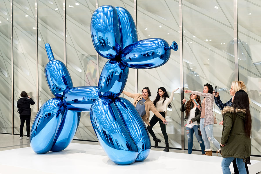 This is an image of an art exhibition. Some galleries and museums are the trampolines of artistic success. By showing at major galleries or museums you are propelled towards superstar status in the art world.