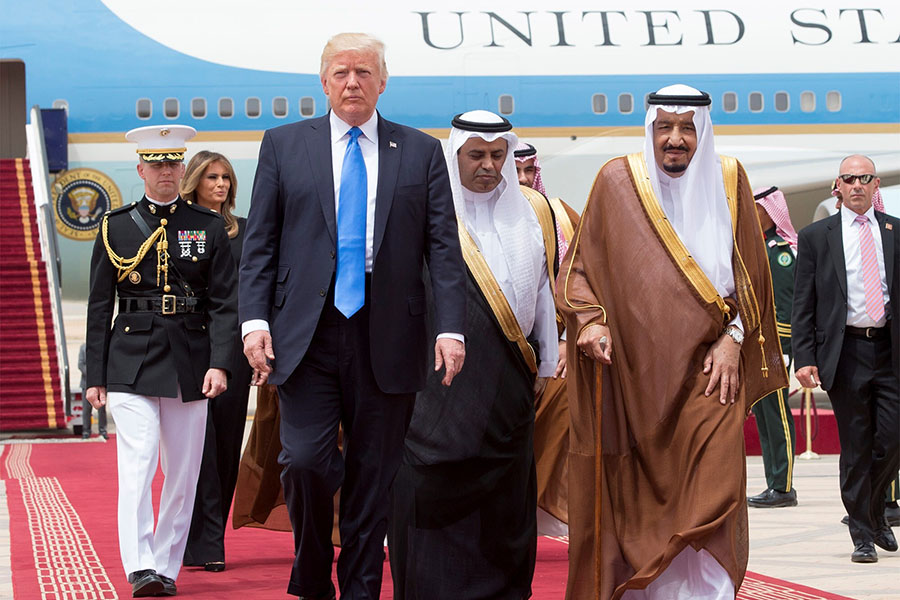 File photo: US President Donald Trump (left 2) and his wife Melania Trump are welcomed by Saudi Arabia's King Salman bin Abdulaziz Al Saud (right 2) during their arrival at the King Khalid International Airport in Riyadh, Saudi Arabia on May 20, 2017. Image:
Bandar Algaloud / Saudi Royal Council / Handout/Anadolu Agency/Getty Images