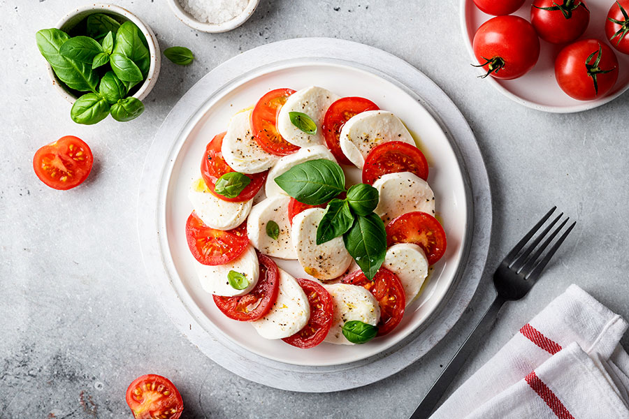 A tasty tomato-mozzarella salad could soon cost us more.
Image: Shutterstock