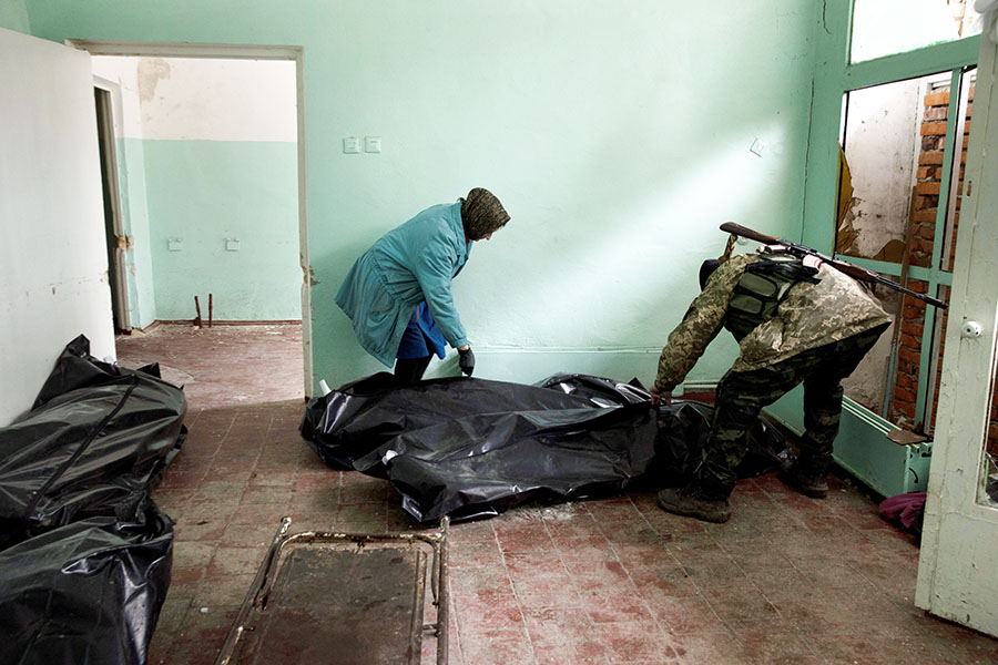 The bodies of Russian soldiers in the morgue in Trostyanets, Ukraine, on Friday, April 1, 2022. The Biden administration is quietly circulating an estimate of Russian casualties in Ukraine that far exceeds earlier U.S. estimates, telling lawmakers that more than 75,000 members of Russia’s forces had been killed or injured. (Tyler Hicks/The New York Times)