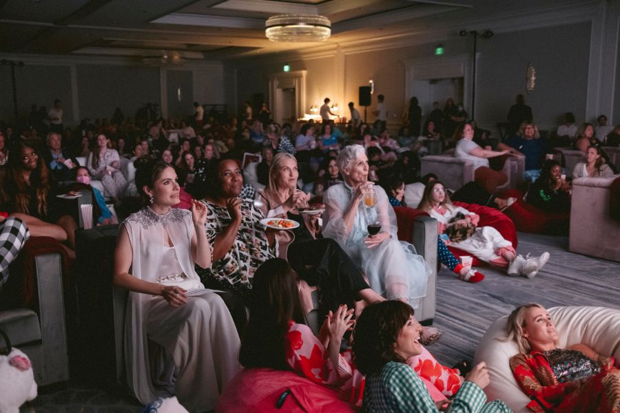 Tosca Musk and her mother Maye, right half of the couch, at the screening of a Passionflix show during PassionCon at the Ritz-Carlton Marina del Rey in Los Angeles, May 6, 2022. Tosca Musk, a younger sibling of multi-billionaire Elon Musk, is the force behind Passionflix, an upstart subscription streaming service dedicated to movie and series adaptations of mass-market romance novels and erotic fan fiction. Image: Mark Abramson/The New York Times