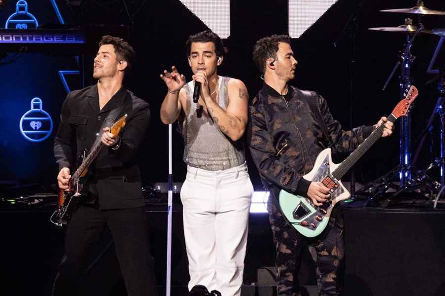 The Jonas Brothers now offer exclusive content to their fan community via Scriber.
Image: Yuki Iwamura / AFP