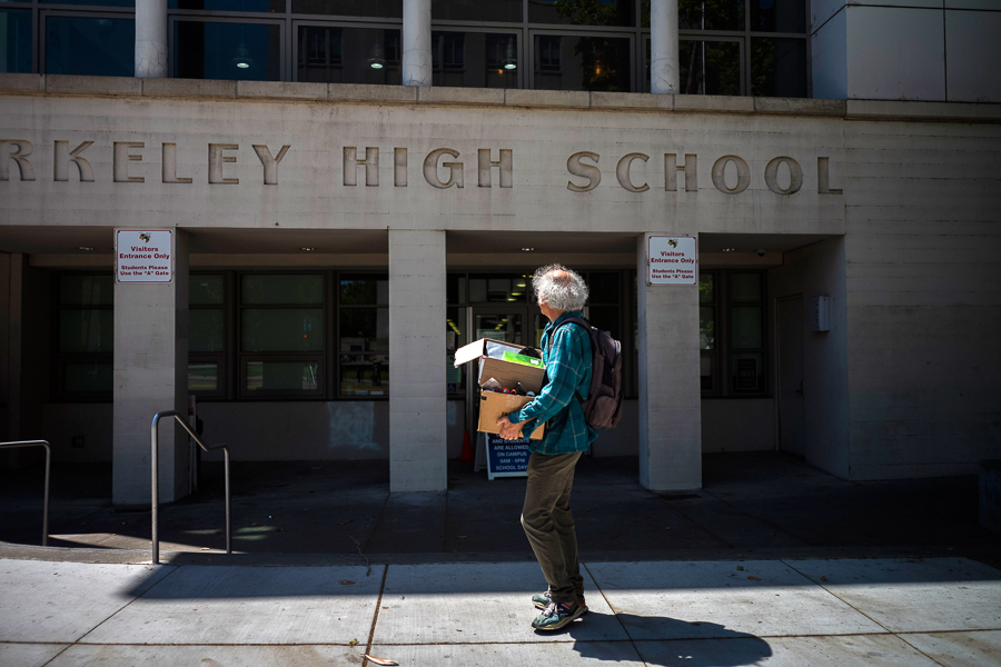 Dan Plonsey, a math teacher at Berkeley High Scholl, packs up after the end of the school year at Berkeley, Calif., on June 4, 2022. Plonsey canceled final exams and called in sick last week after a student was arrested in what the authorities described as a plot to attack the high school. (Brian L. Frank/The New York Times)