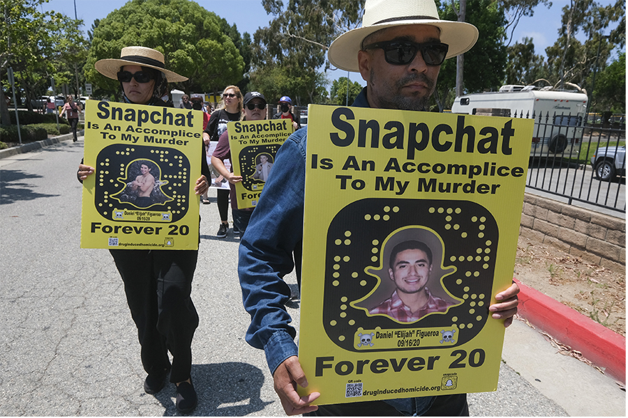 People participating in a rally over drug deals on Snapchat. 
