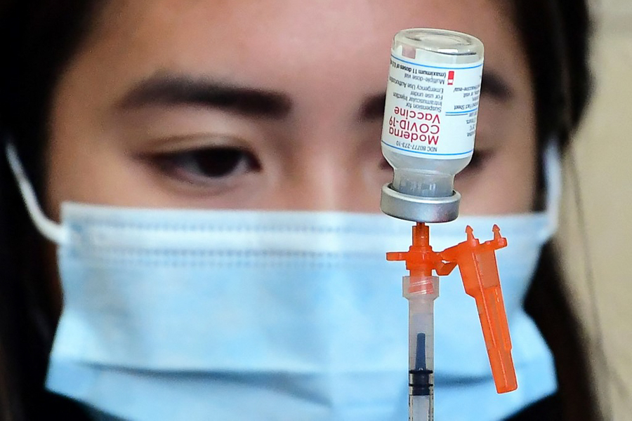 Moderna Covid-19 vaccine being prepared in Los Angeles.