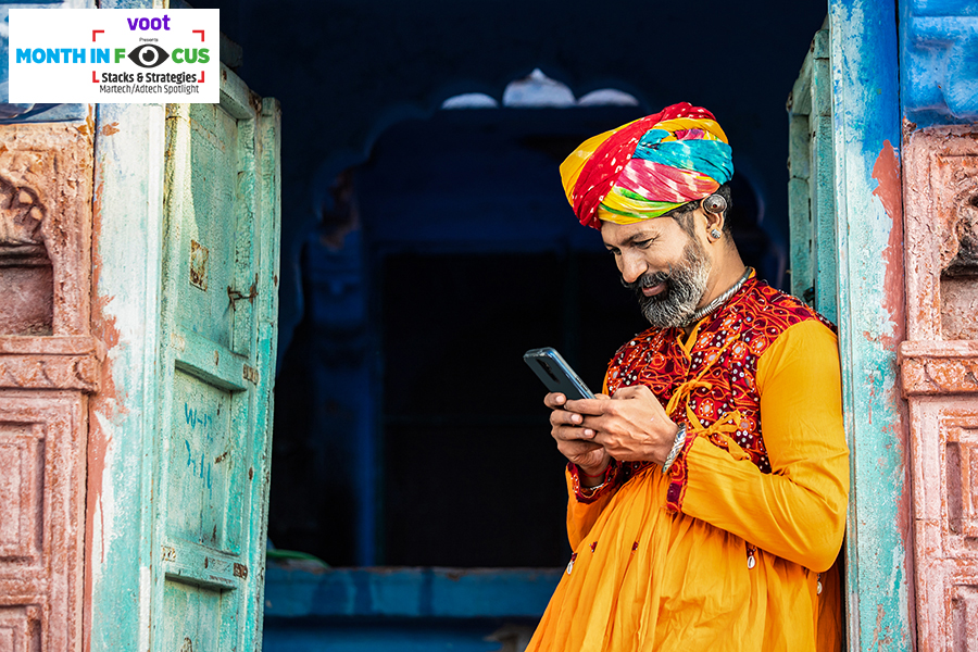 It is an image of a man checking his phone. As more Indians log onto the internet, the demand for local language content is steadily growing, followed by the need for advertisers to consider creating regional advertising which has gone beyond dubbed ads
