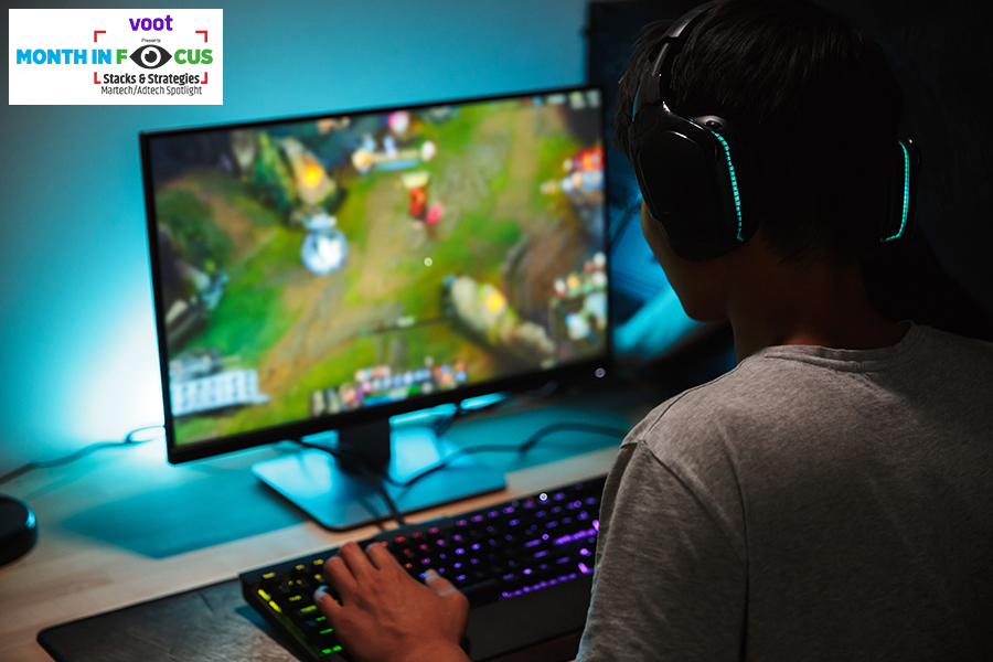 It is an image of a person playing a video game on their PC. More and more gaming companies in India are acquiring adtech firms or building capabilities to get hold of first-party data and offer better ROI to advertisers. Here's how it works