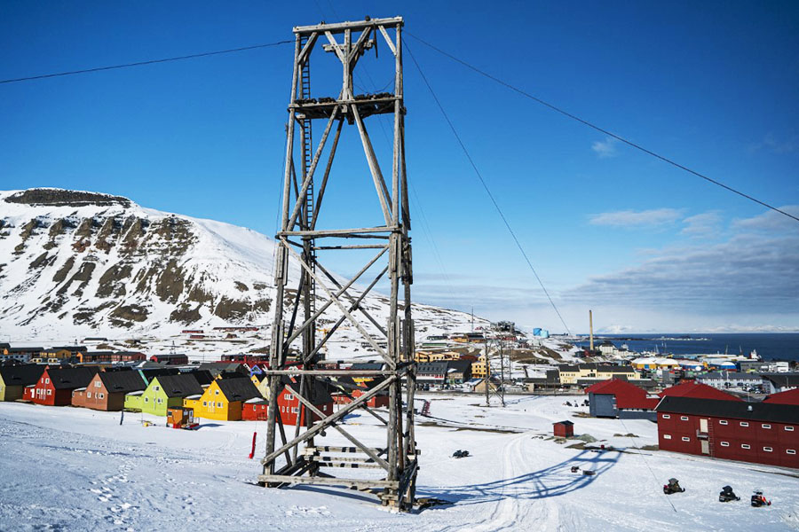 Conveyor towers once used for transporting coal from the mines to the harbour, are pictured in Longyearbyen on May 6, 2022, on the Svalbard Archipelago, northern Norway