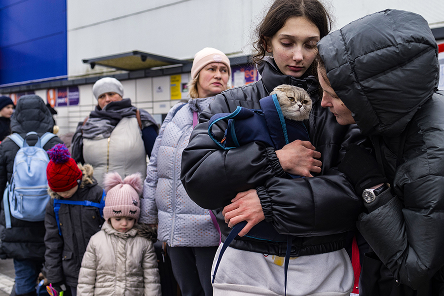 Sofia and Svetlana Klimienko, who fled the fighting in Kharkiv, Ukraine, huddle with their car Amelie after arriving in Przemysl, Poland, on Monday, March 7, 2022. Kharkiv is close to the border with Russia, and as one of the first targets of the Russian invading forces, it has come under some of the heaviest bombardment of the war so far.
Image: Maciek Nabrdalik/The New York Times