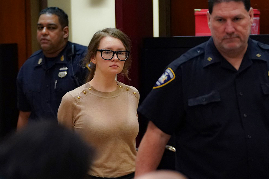 Anna Sorokin better known as Anna Delvey, the 28-year-old German national, whose family moved there in 2007 from Russia, is seen in the courtroom  during her trial at New York State Supreme Court in New York on April 11, 2019. - The self-styled German ìheiressî has been charged with grand larceny and theft of services charges alleging she swindled various people and businesses. (Photo by TIMOTHY A. CLARY / AFP)