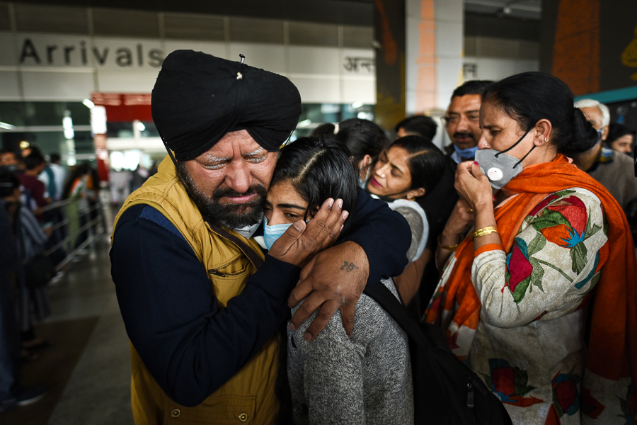 A student embraces her father overcome with emotion at the international airport in Delhi upon her return from conflict-torn Ukraine on an Indian rescue aircraft on March 5, 2022 in New Delhi, India.
Photo by Sanchit Khanna/Hindustan Times via Getty Images