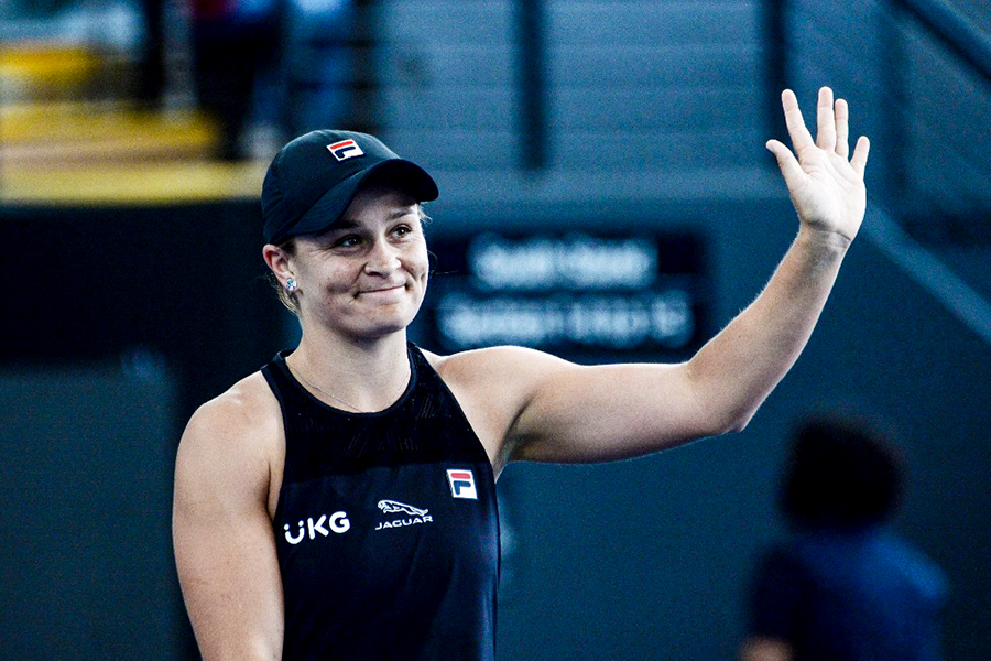 This file photo taken on January 7, 2022 shows Australian Ashleigh Barty celebrating after defeating Sofia Kenin of the US at the Adelaide International WTA women's singles tennis tournament in Adelaide. - Australian world number one Ashleigh Barty shocked the tennis world by announcing her retirement from the sport on March 23, 2022 at the age of just 25. (Photo by Brenton Edwards/ AFP) 