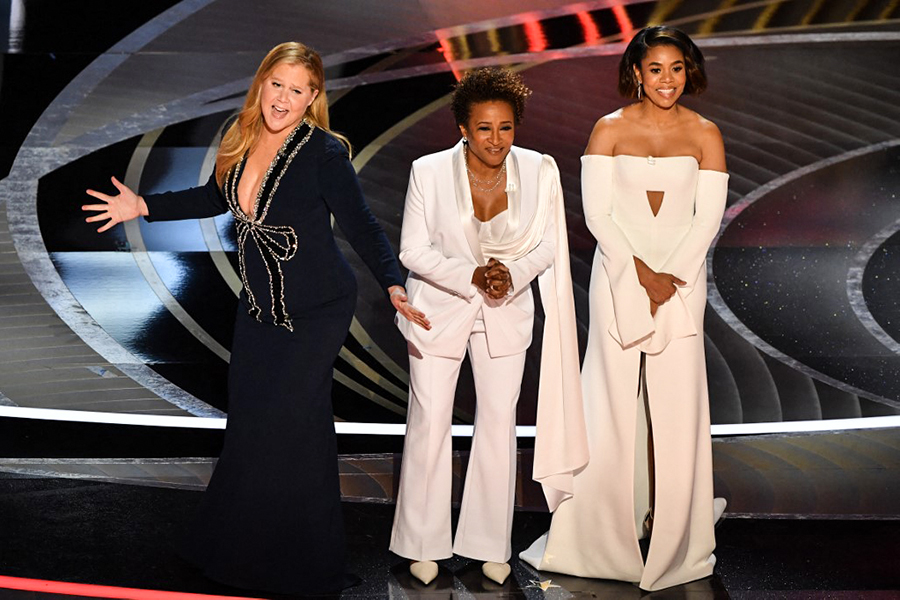 US actress and comedian Amy Schumer (L), US actress and comedian Wanda Sykes (C) and US actress Regina Hall speak onstage during the 94th Oscars at the Dolby Theatre in Hollywood, California on March 27, 2022.
Image: Robyn Beck / AFP