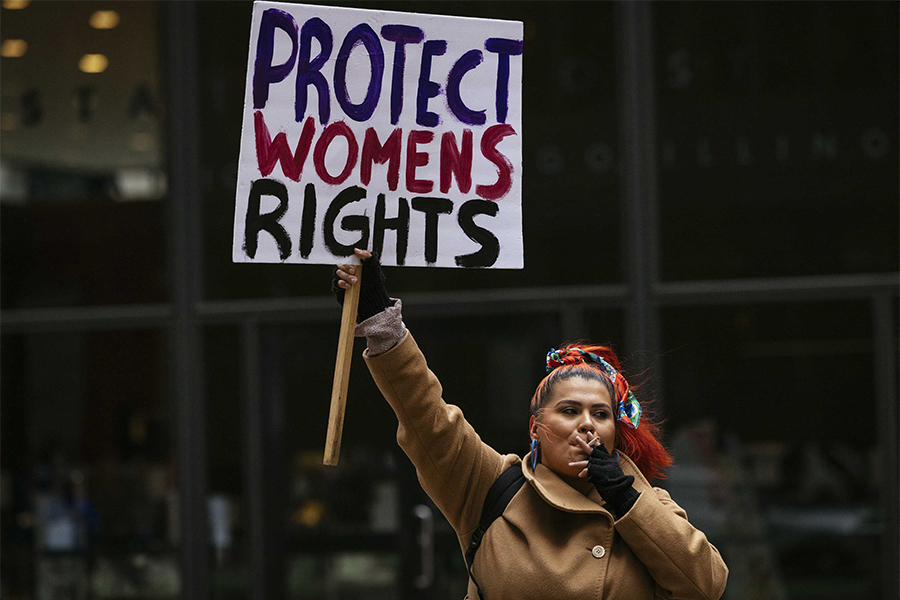 Demonstrators gather at the Federal Plaza in Chicago, following a leaked draft opinion that the Supreme Court has potentially voted to overturn Roe V. Wade, May 3, 2022. (Taylor Glascock/The New York Times
