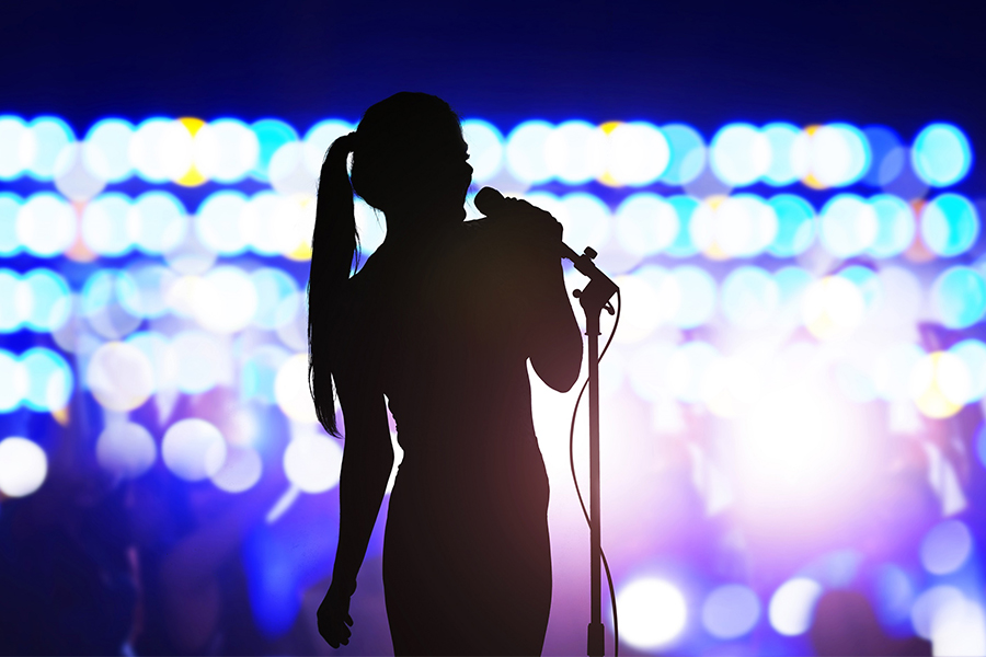 Singing could help improve shortness of breath in people with long Covid. (Credits: FangXiaNuo / Getty Images)

