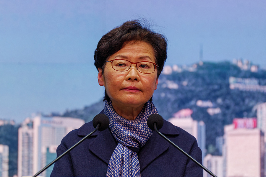 Carrie Lam, Hong Kong's first woman leader's term was dominated by massive democracy protests and Beijing's subsequent crackdown, as well as a zero-Covid pandemic strategy that kept the city isolated while rivals reopened. (Credits: Daniel SUEN / AFP)

