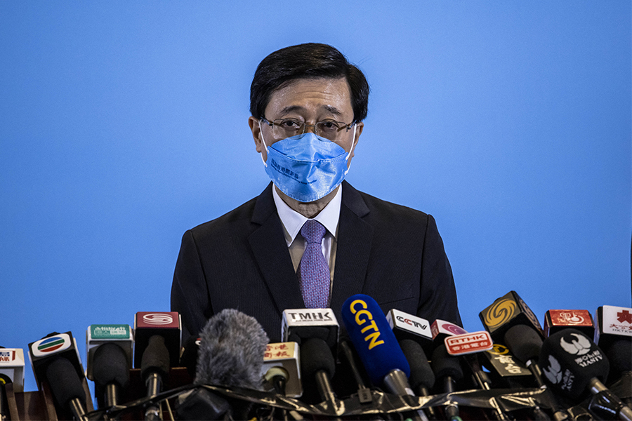 Hong Kong's next leader John Lee is inheriting a once vibrant Asian business hub mired in its third year of pandemic isolation but he may prioritise security over an economic reboot, business leaders and observers say. (Credits: ISAAC LAWRENCE / AFP)

