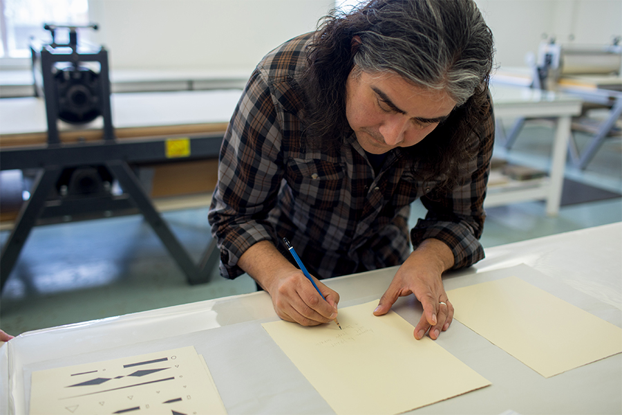 The composer and artist Raven Chacon, a member of the Navajo Nation, at Crow’s Shadow Institute for the Arts, in Pendleton, Ore., Feb. 17, 2019. Chacon’s “Voiceless Mass,” a work for ensemble and pipe organ that “evokes the weight of history in a church setting,” won the Pulitzer Prize in Music on Monday, May 9. (Credits: Celeste Noche/The New York Times)