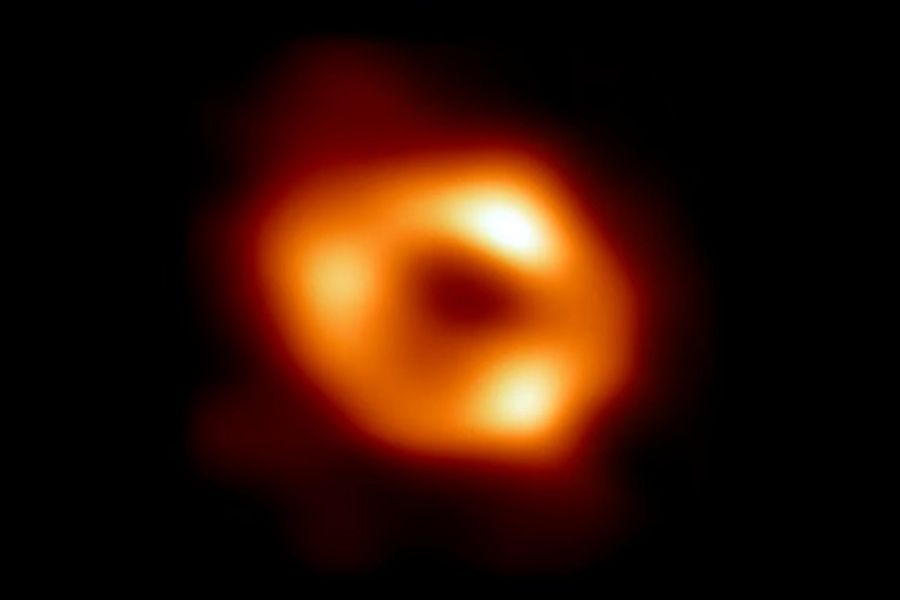An image provided by the Event Horizon Collaboration and the National Science Foundation shows the first direct image of Sagittarius A*, the black hole at the center of the Milky Way. Astronomers announced on Thursday, May 12, 2022, that they had pierced the veil of darkness and dust at the center of our Milky Way galaxy to capture the first picture of “the gentle giant” dwelling there: a supermassive black hole, a trapdoor in space-time through which the equivalent of four million suns have been dispatched to eternity, leaving behind only their gravity and violently bent space-time. Image: Event Horizon Collaboration/National Science Foundation via The New York Times