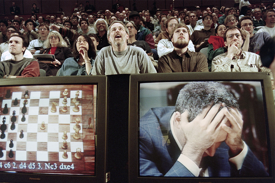 On May 11, Garry Kasparov shot a final dark glance at the chessboard before storming out of the room: the king of chess had just been beaten by a computer. Image: Stan Honda/ AFP