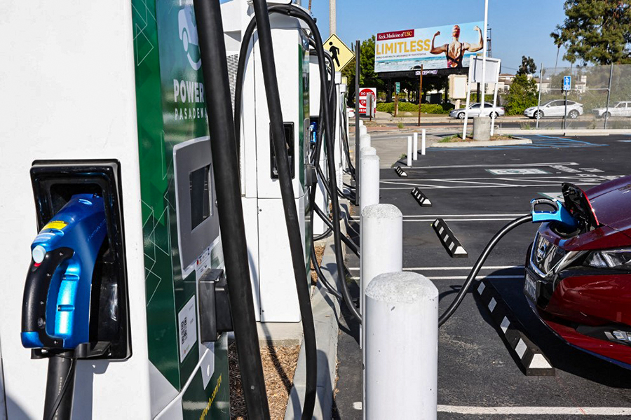 A Nissan electric vehicle recharges at a Power Up fast charger station on April 14, 2022 in Pasadena, California. California has unveiled a proposal which would end the sale of gasoline-powered cars requiring all new cars to have zero emissions by 2035. (Credits: Mario Tama/Getty Images/AFP)