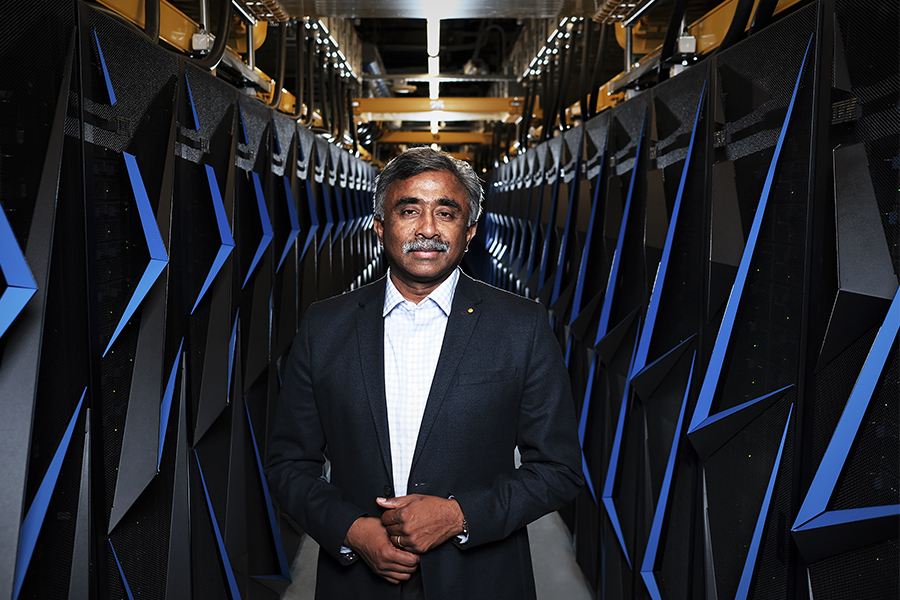 Thomas Zacharia, director of the Oak Ridge National Laboratory, with an earlier supercomputer at the lab in Oak Ridge, Tenn., June 6, 2018. The United States has regained a coveted speed crown in computing with a powerful new supercomputer in Tennessee, a milestone for the technology that plays a major role in science, medicine and other fields. 
