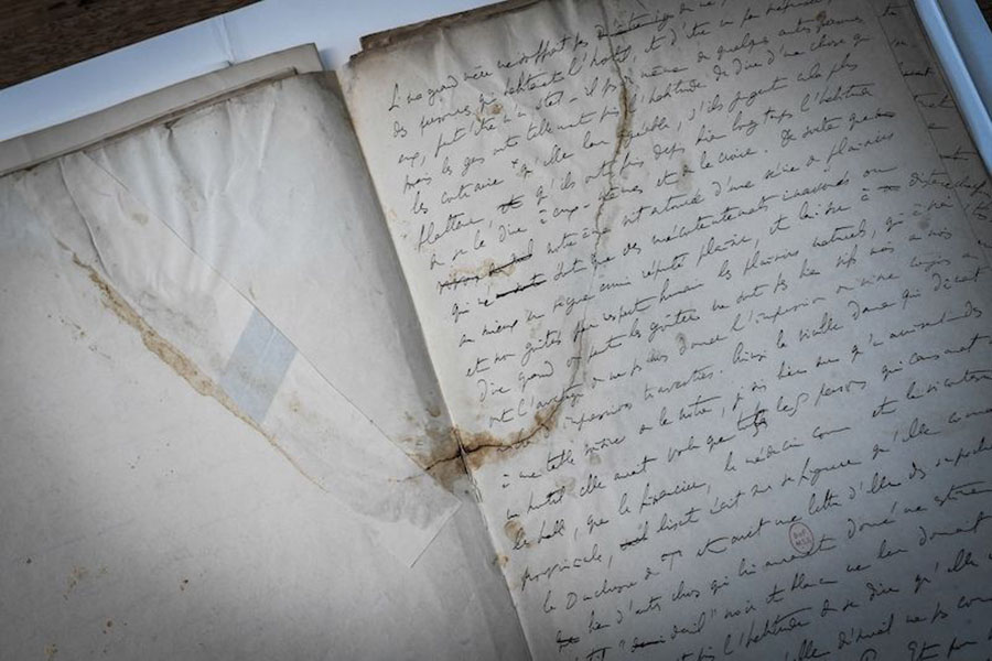This photograph taken on July 8, 2022 shows a slip of an original manuscript of late French writer Marcel Proust prior to its renovation at the 