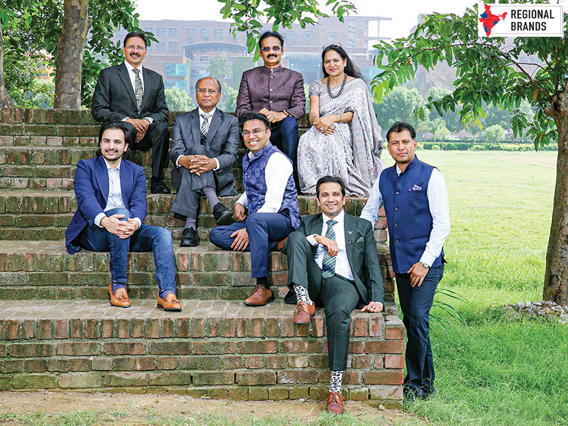 (Top row, L to R) Naresh Mittal, vice chairman, Lovely Group; Ashok Kumar Mittal, president, Lovely Group; Rashmi Mittal, pro chancellor, Lovely Professional University. (2nd row) Ramesh Mittal, chairman, Lovely Group (3rd row, L to R) Vaibhav Mittal, vice president, Lovely Group; Aman Mittal, vice president, Lovely Professional University. (Last row) Shaishav Mittal, COO, Lovely Sweets and Bake Studio (Standing) Amit Mittal, COO, Lovely Autos
Image: Madhu Kapparath