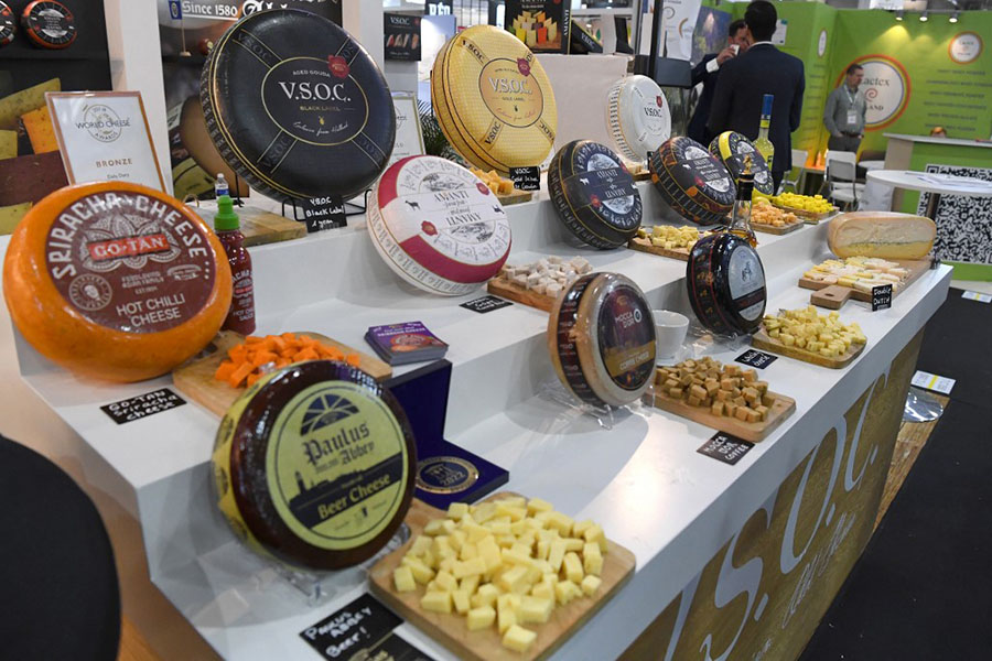Different types of cheese from the Netherlands are displayed at the Paris 2022 International Food Fair (SIAL) in Villepinte, northern Paris on October 15, 2022. Image: Eric Piermint / AFP
