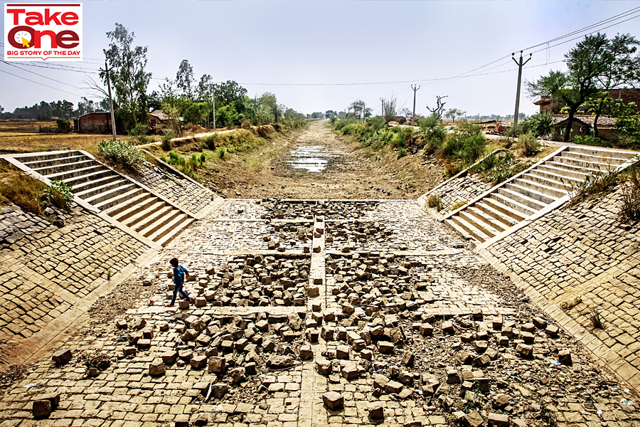 A file photo of a dried canal in late May in Badokhar village on the outskirts of Allahabad, Uttar Pradesh. A severe heatwave in May had caused drought-like conditions in vast swathes of India's agricultural heartland as the rains that usually arrive before the country's prolonged monsoon season had failed. India is particularly vulnerable to drought as its under-developed agriculture sector is heavily dependent on timely, uninterrupted natural weather cycles for its survival.
Image: Ritesh Shukla/Getty Images