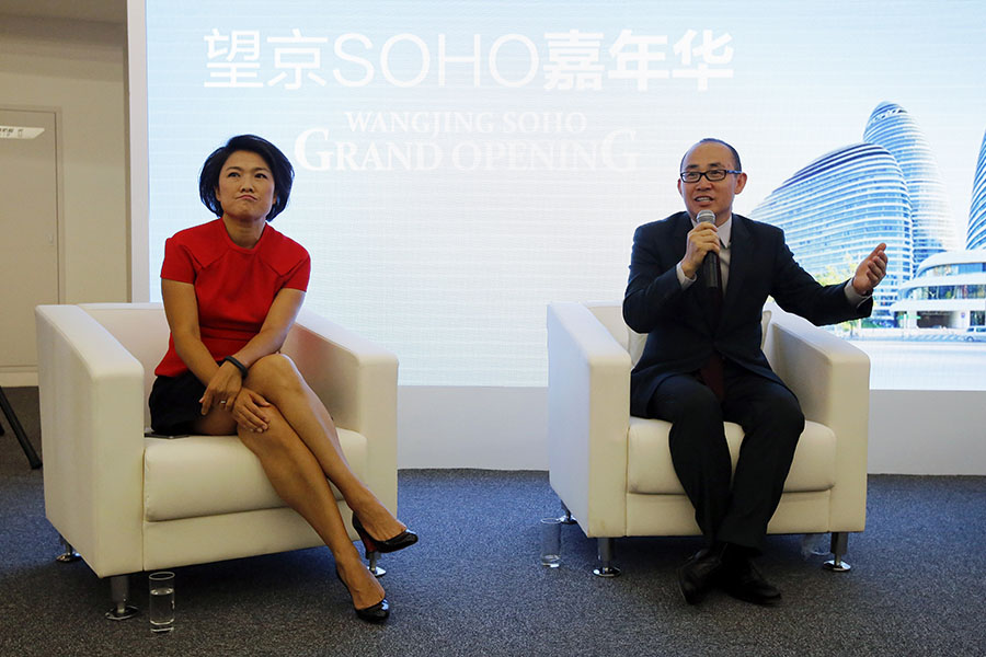 A file photo of SOHO China Chairman Pan Shiyi (R) and CEO Zhang Xin during a news conference to mark the opening of Wangjing SOHO, China
Image: Barry Huang / Reuters