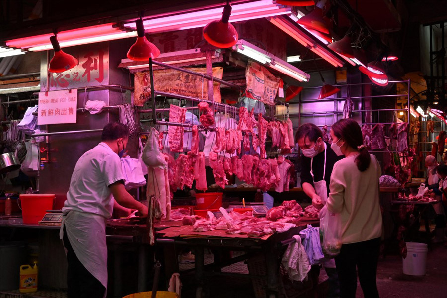 Pork prices in the country have continued to rise since mid-March, despite government intervention, hitting 31.17 yuan (.40) a kilo last week. Image: Peter Parks/AFP 