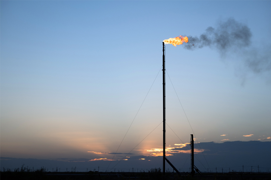 A flare in the Permian Basin in Coyanosa, Texas, on Aug. 12, 2020. Methane is a stronger, though shorter-lived, greenhouse gas than carbon dioxide. (Jessica Lutz/The New York Times)