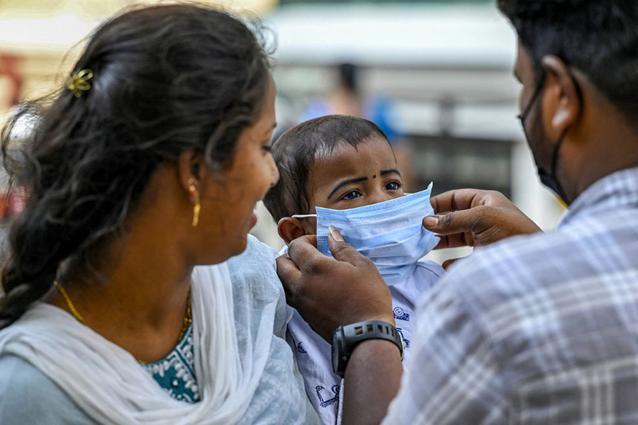 A healthcare worker collects a swab sample of a woman for Covid-19 test, amid a rise in coronavirus cases in India, in New Delhi on April 17, 2023. Image: Arrush Chopra/NurPhoto via Getty Images
