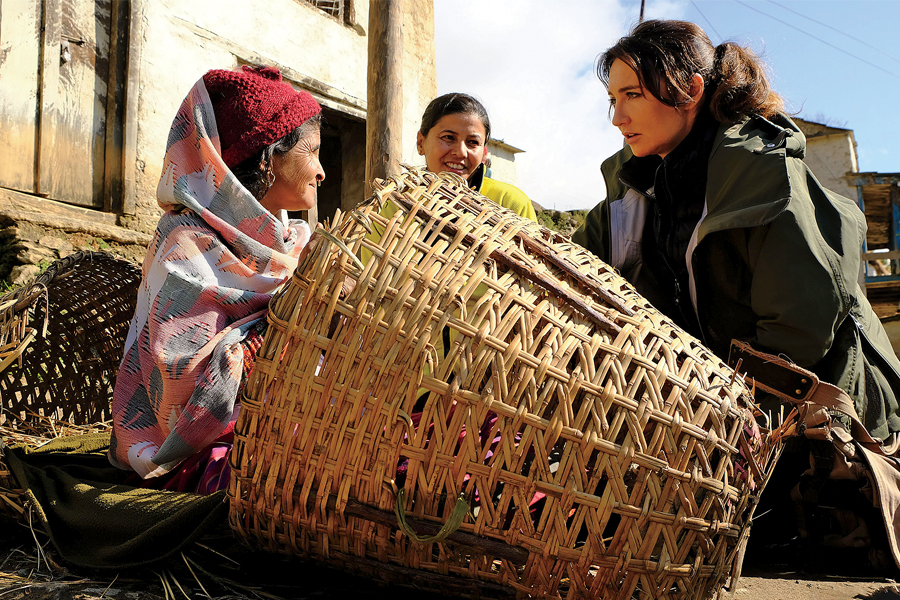 Hands-On Heiress: Kulczyk in Nepal in 2020, filming a documentary about women being banished from their homes and forced to sleep in baskets while menstruating. The billionaire has made eight trips a year for nearly a decade for her docuseries, The Domino Effect