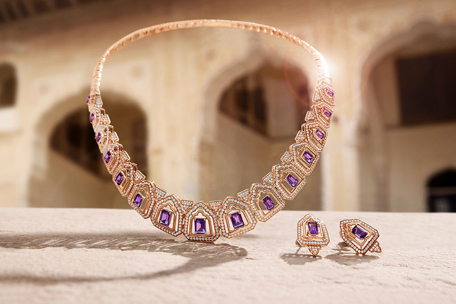 This necklace, part of the ‘Tales of Mystique’ by Tanishq, features elements inspired by jharokhas with amethyst in the centre. Image credit: Tanishq.
