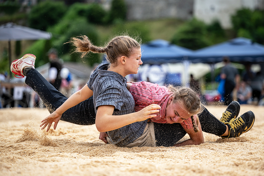 Wrestlers compete during the Women's wrestling festival in Estavayer-le-Lac, on July 1, 2023. Wrestlers compete during the Women's wrestling festival in Estavayer-le-Lac, on July 1, 2023.
Image: Fabrice Coffrini / AFP