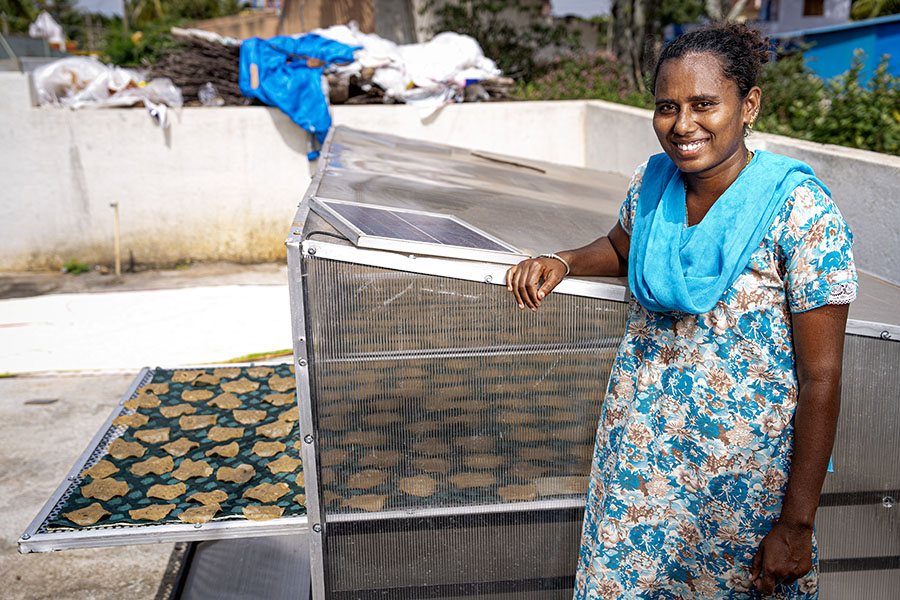 Ramya Kumar has been using the solar-powered milking machine for the last two years now. Earlier, milking the cows manually would take 30 minutes, now it only takes 5 minutes to milk each cow with this machine; Image: Selvaprakash Lakshmanan for Forbes India