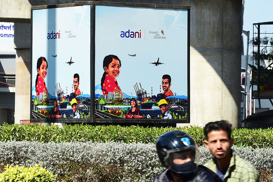 The Adani Group is in talks with Abu Dhabi Investment Authority  (ADIA) and International Holding Company (IHC) for an investment of  billion by selling stakes in its subsidiaries.
Image: Sam Panthaky / AFP