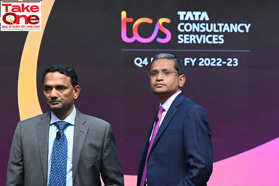 (File) Rajesh Gopinathan (R), chief executive and managing director of India's largest software exporter Tata Consultancy Services (TCS) and  Krithi Krithivasan, CEO-designate, attends a news conference to announce company's annual earnings results, in Mumbai on April 12, 2023. 
Image: Indranil Mukherjee / AFP